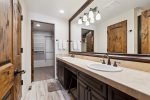 Bunkroom bathroom with double sinks